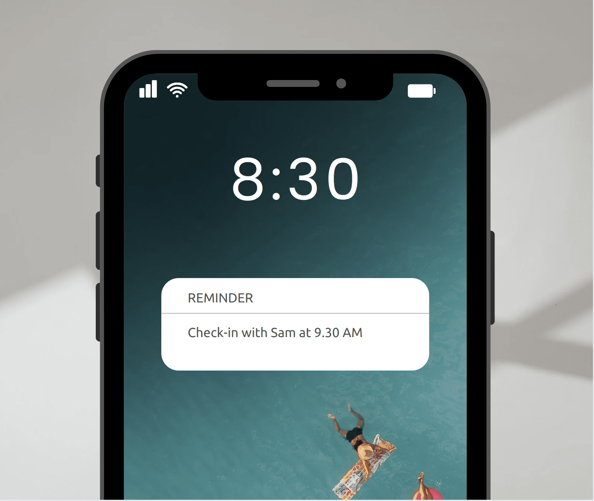 Close-up of a smartphone lock screen showing a reminder notification: "Check-in with Sam at 9:30 AM."